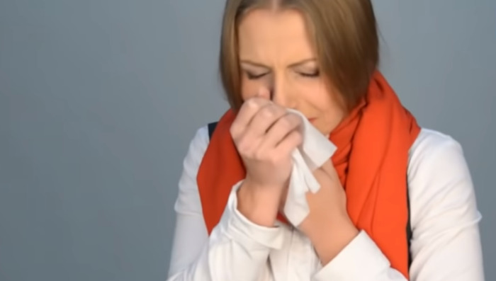 women sneezing