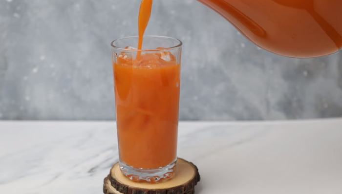 Carrot apple juice in glass