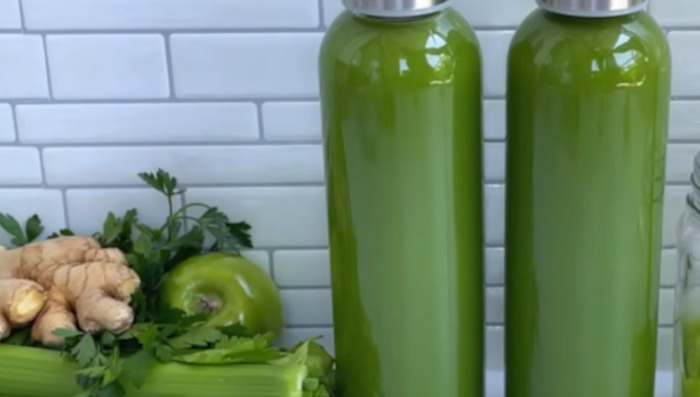celery juice in glass bottle