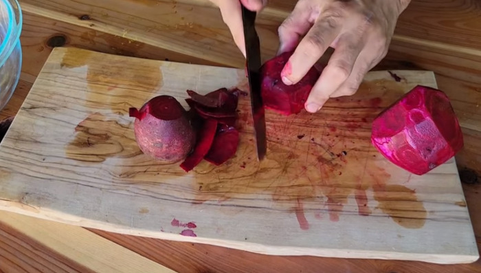 cutting beetroot with knife