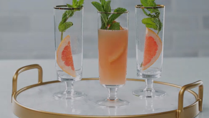 grapefruit and mint juice in glass