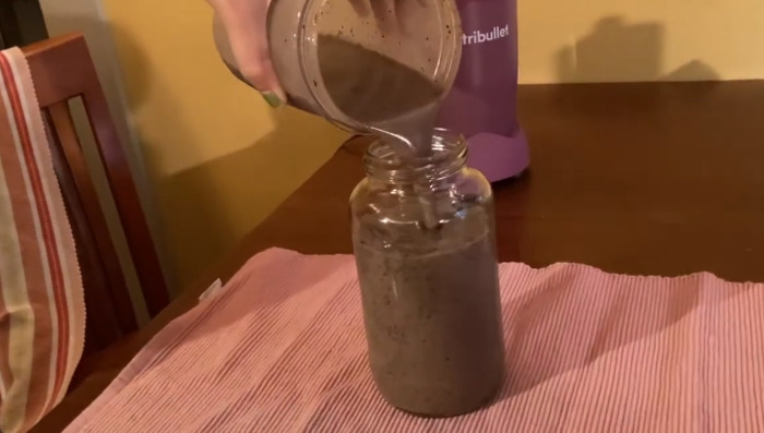 Pouring mushroom smoothie