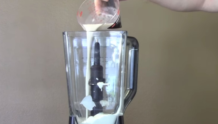pouring milk in blender
